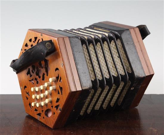 A late Victorian twenty nine button concertina, 7in.